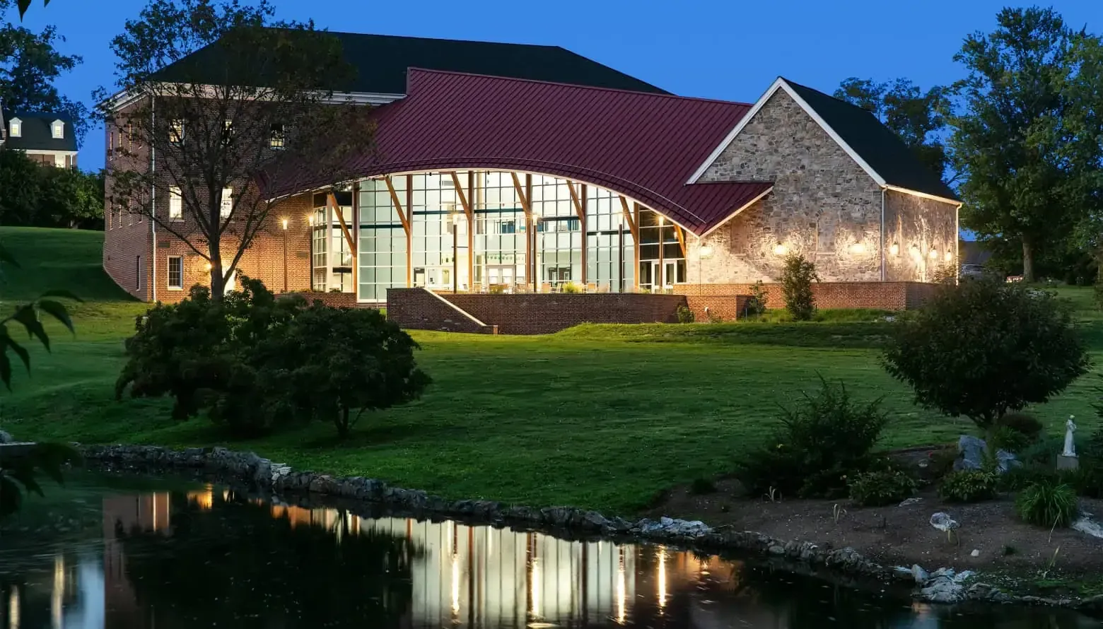 imgi_59_Saint-James-School-Pohanak-Fine-Arts-Center-Dusk-Exterior.webp